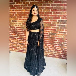 Gorgeous black off shoulder embroidered sleeve lehenga. Size M